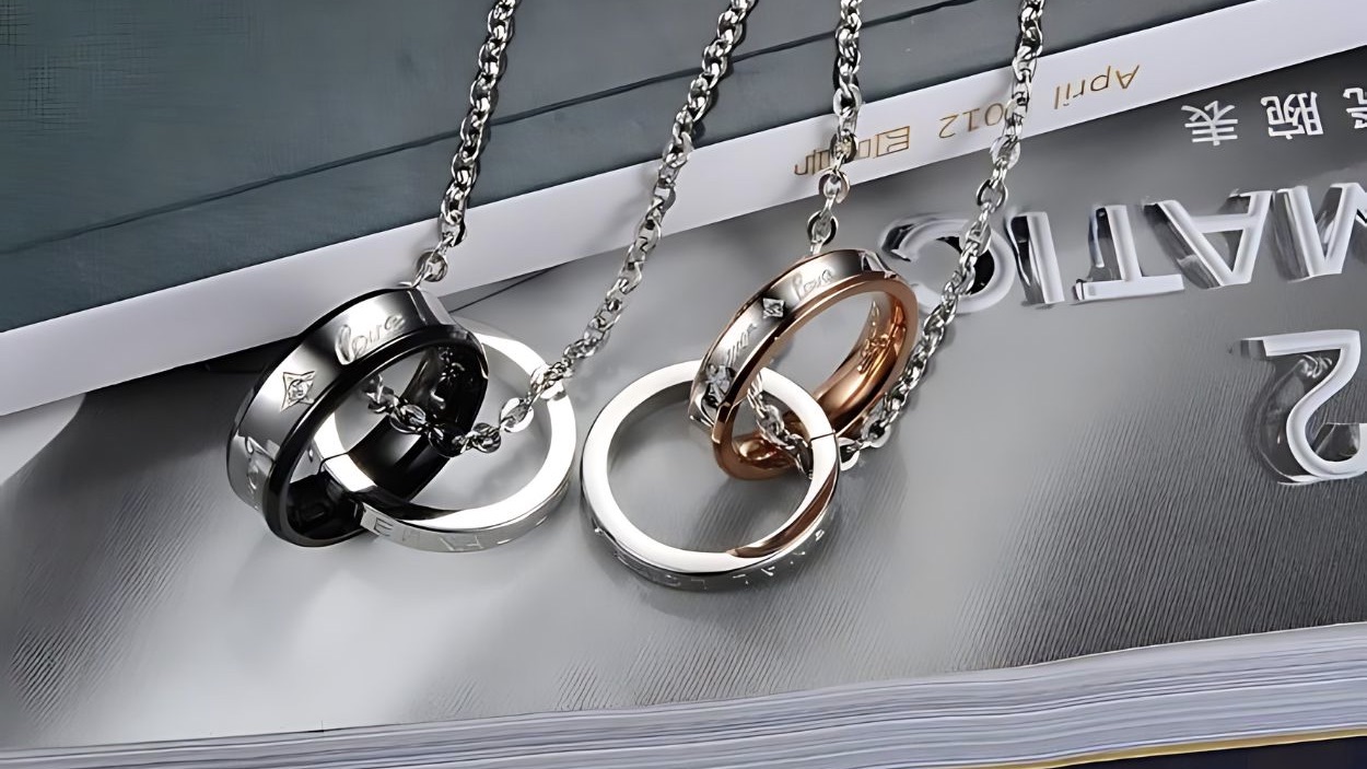 Black and silver ring jewellery on a magazine page